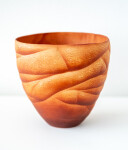 This contemporary saffron coloured ceramic vase has an organic shape inspired by nature. Image 3