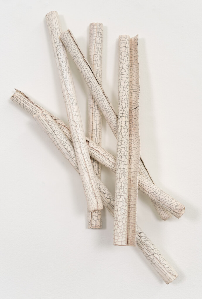 This contemporary sculptural ceramic wall composition is by Paula Murray.