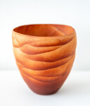 This contemporary saffron coloured ceramic vase has an organic shape inspired by nature. Image 2
