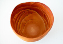 This contemporary saffron coloured ceramic vase has an organic shape inspired by nature. Image 7