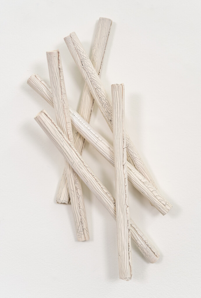 This contemporary sculptural ceramic wall composition is by Paula Murray.