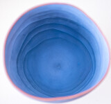 This contemporary blue ceramic vase has an organic shape inspired by nature. Image 7