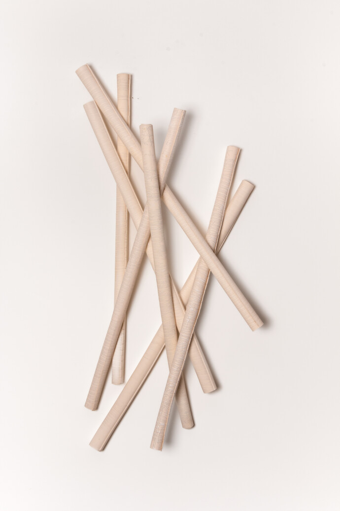 This contemporary sculptural ceramic wall composition is by Paula Murray.