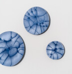 This contemporary horizontal wall composition by Paula Murray is composed of blue porcelain discs. Image 5