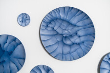 This contemporary horizontal wall composition by Paula Murray is composed of blue porcelain discs. Image 6