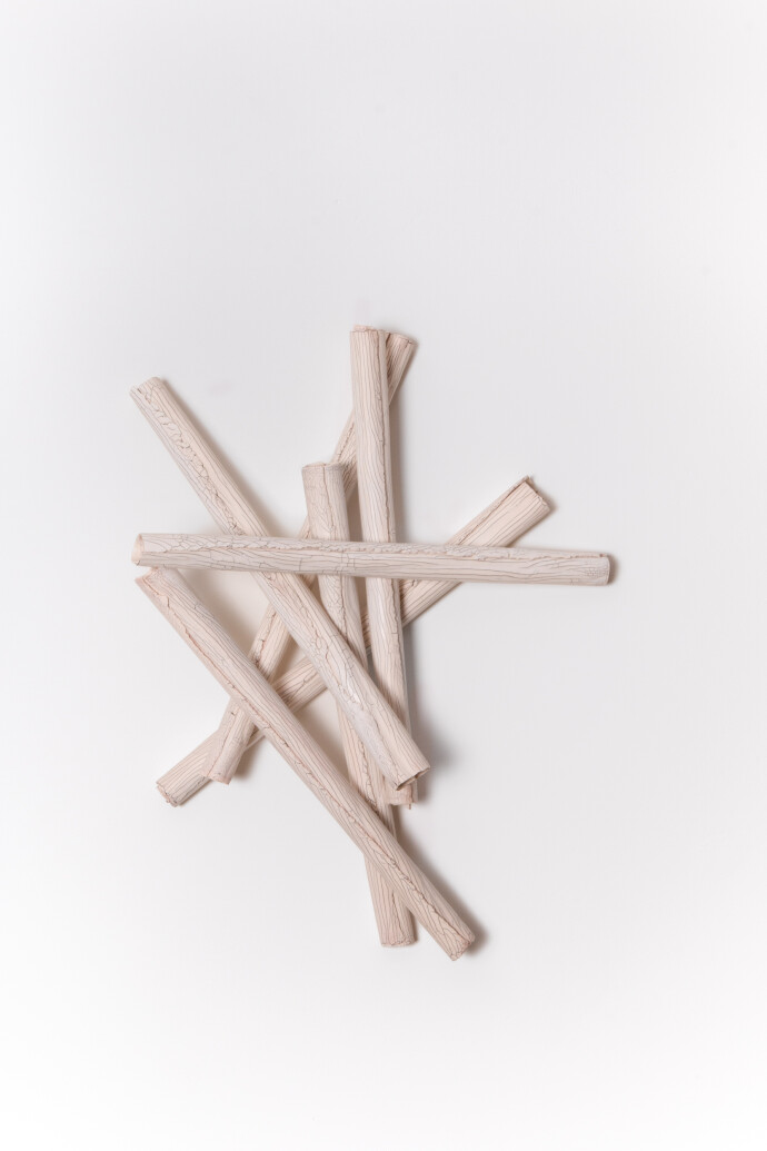 This contemporary sculptural ceramic wall composition is by Paula Murray.