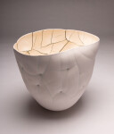 This white ceramic vessel’s organic shape was inspired by nature. Image 2