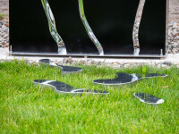 This modern black-painted steel outdoor sculpture is by Philippe Pallafray. Image 4