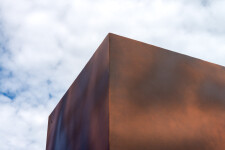 This contemporary outdoor metal sculpture is geometric in shape. Image 8