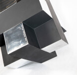 This contemporary table top metal sculpture of a black cube is by Philippe Pallafray. Image 5