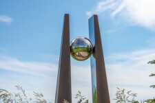 This contemporary outdoor architectural sculpture is forged from steel. Image 6