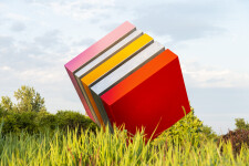 Philippe Pallafray’s latest sculpture—an eye-popping candy-coloured large steel cube—each stripe painted in bright red, orange and pink bala… Image 3
