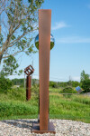 This contemporary outdoor architectural sculpture is forged from steel. Image 3