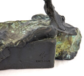 This bronze statuette of a female nude with arms stretched and straining above the head, the stabilizing legs on uneven ground was created r… Image 8