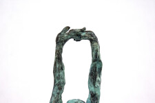 This bronze statuette of a female nude with arms stretched and straining above the head, the stabilizing legs on uneven ground was created r… Image 6