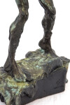 This bronze statuette of a female nude with arms stretched and straining above the head, the stabilizing legs on uneven ground was created r… Image 9