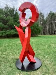 This large scale abstract metal sculpture in red painted metal is by Rob Lorenson. Image 3