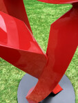This large scale abstract metal sculpture in red painted metal is by Rob Lorenson. Image 6
