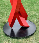 This large scale abstract metal sculpture in red painted metal is by Rob Lorenson. Image 7