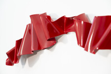 This contemporary wall sculpture is forged from steel and painted red. Image 6