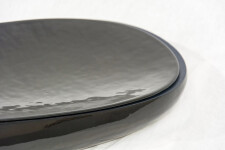 In a stunning glossy black, master ceramicist Steven Heinemann has created this unique handcrafted sculpture. Image 3