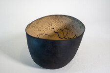 This contemporary ceramic black and melon coloured bowl is by Steven Heinemann. Image 4