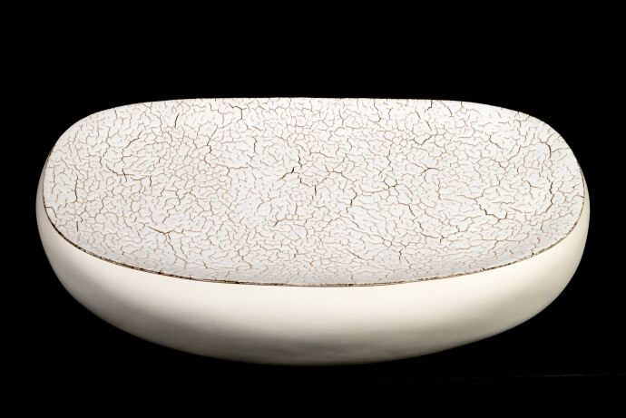 Inspired by the rugged landscape of Canada’s north—Ellesmere (named for the island in Nunavut) is a gorgeous creamy white ceramic object.