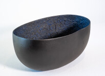 This contemporary ceramic black bowl that features an infinity loop is by Steven Heinemann. Image 2