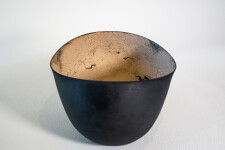 This contemporary ceramic black and melon coloured bowl is by Steven Heinemann. Image 2
