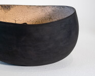 This contemporary ceramic black and melon coloured bowl is by Steven Heinemann. Image 7