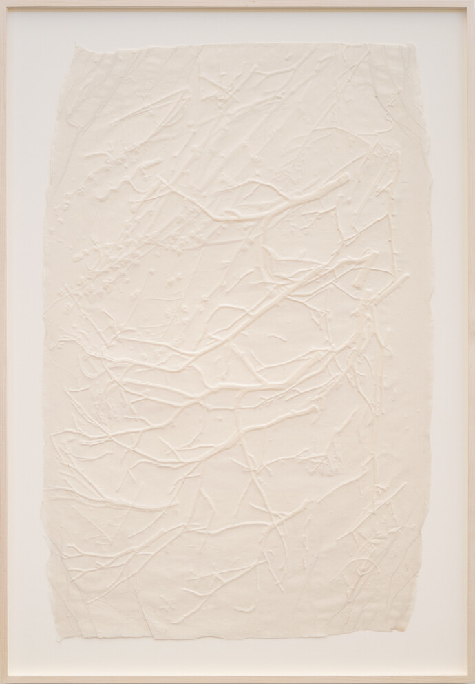 This unique embossed white print was inspired by nature and features tree imagery.