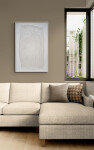 This unique embossed white print was inspired by nature and features tree imagery. Image 10