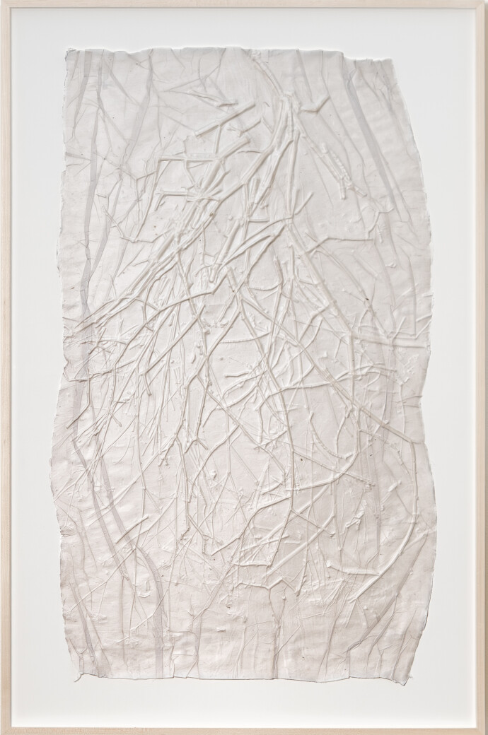 This unique embossed white print was inspired by nature and features tree imagery.