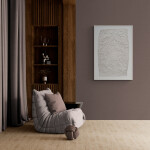 This unique embossed white print was inspired by nature and features tree branch imagery. Image 11