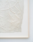 This unique embossed white print was inspired by nature and features tree branch imagery. Image 5