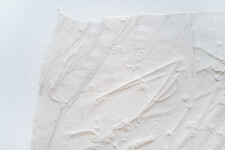 This unique embossed white print was inspired by nature and features tree branch imagery. Image 7