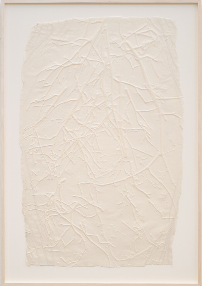 This unique embossed white print was inspired by nature and features tree imagery.