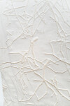 This unique embossed white print was inspired by nature and features tree branch imagery. Image 8
