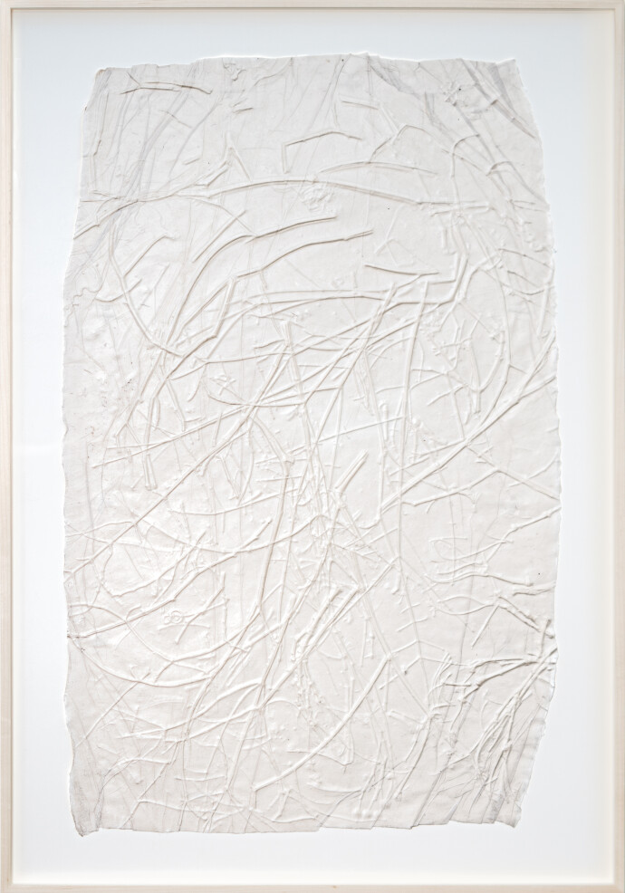 This unique embossed white print was inspired by nature and features tree imagery.
