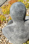 This figurative minimalist outdoor sculpture is made of concrete. Image 8
