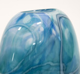 This beautiful aqua blue vessel in blown glass takes its organic shape and wild patterns from nature. Image 3