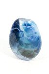 This beautiful swirling sky blue vessel in blown glass takes its organic shape and wild patterns from nature. Image 5