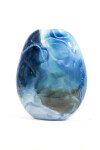 This beautiful swirling sky blue vessel in blown glass takes its organic shape and wild patterns from nature. Image 4