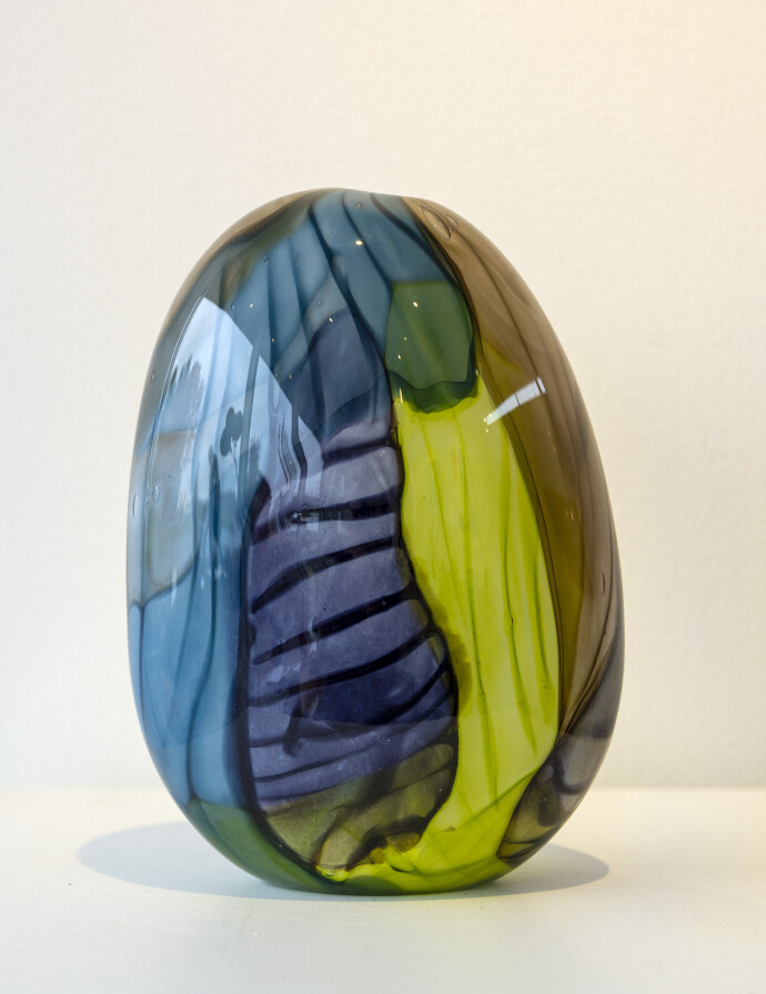 This contemporary blue and green coloured glass vessel is by Susan Rankin.