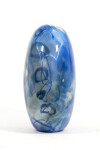 This beautiful blue flattened vessel in blown glass takes its organic shape and wild patterns from nature. Image 2