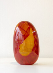 This contemporary red and orange coloured glass vessel is by Susan Rankin.