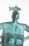 This indoor tabletop figurative sculpture includes a fish and is forged from bronze that is patinated. Image 8