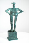 This indoor tabletop figurative sculpture includes a fish and is forged from bronze that is patinated. Image 3