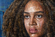 This oil painting is a contemporary portrait of a young black woman. Image 6