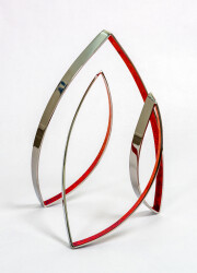 This contemporary indoor metal sculpture symbolizes fire.